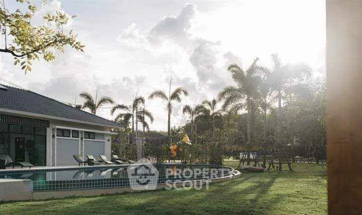 Luxurious villa with private pool and lush garden, perfect for relaxation.