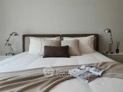 Elegant bedroom with stylish decor and cozy bedding, perfect for relaxation and comfort.