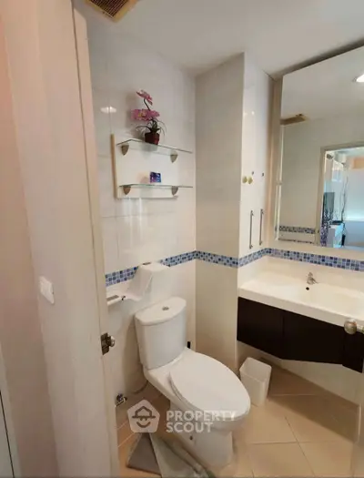 Modern bathroom with sleek fixtures and elegant tile design