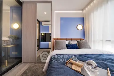 Modern bedroom with stylish decor and ample natural light