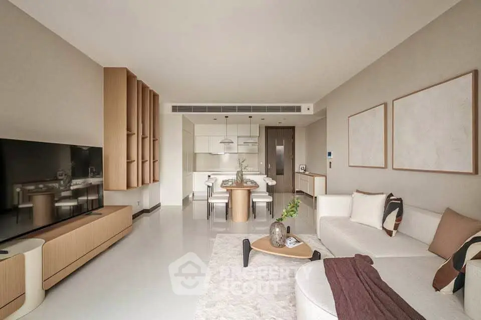 Spacious modern living room with elegant decor and open kitchen layout, perfect for stylish urban living.