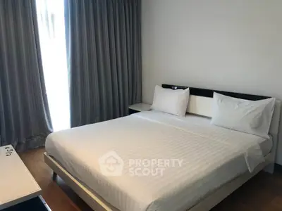 Modern bedroom with minimalist design and cozy ambiance