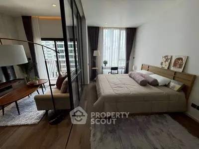 Modern bedroom with large windows and stylish decor in a high-rise apartment