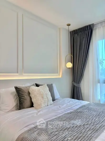 Luxurious bedroom with elegant decor and plush bedding