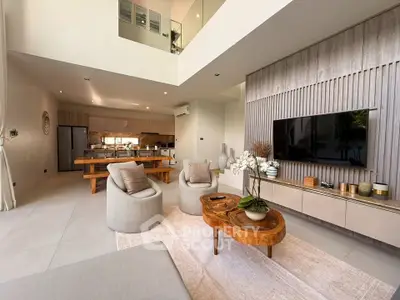 Luxurious open-plan living room with modern decor and stylish furniture in a contemporary home.