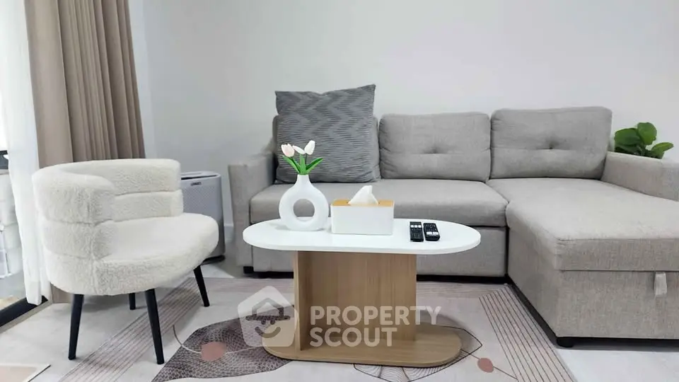 Modern living room with stylish furniture and cozy decor