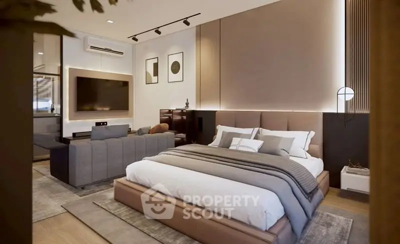 Luxurious modern bedroom with stylish decor and cozy seating area.
