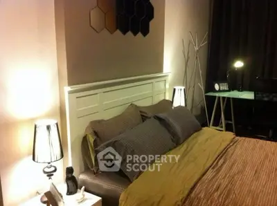 Cozy bedroom with modern decor and stylish lighting