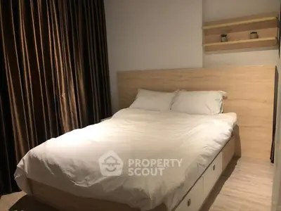 Cozy bedroom with modern wooden bed frame and elegant curtains