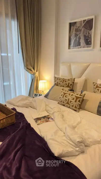 Luxurious bedroom with elegant decor and plush bedding, perfect for relaxation and comfort.