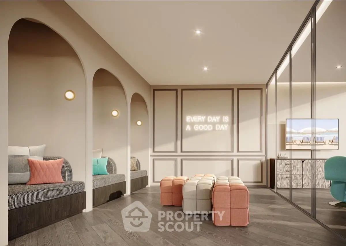 Modern living room with stylish seating and motivational wall decor