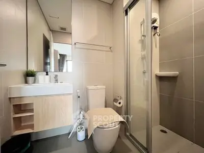 Modern bathroom with sleek shower and contemporary fixtures