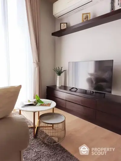 Modern living room with sleek furniture and natural light