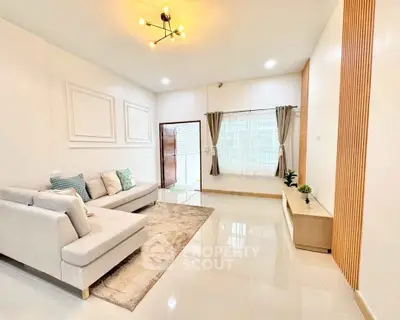 Spacious modern living room with elegant decor and natural light