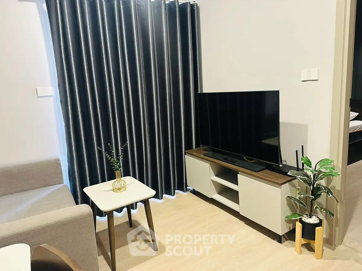 Modern living room with sleek TV setup and stylish decor