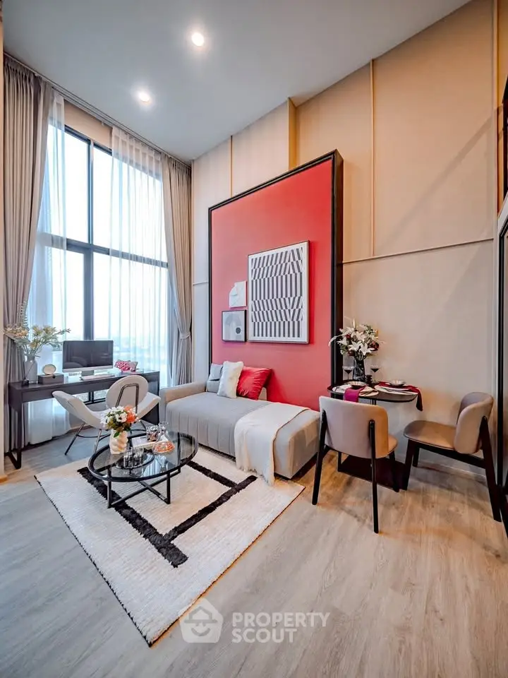 Modern living room with high ceilings and stylish decor