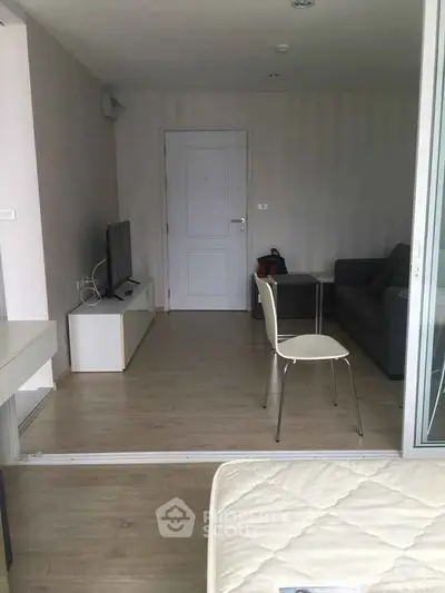 Modern living room with minimalist decor and sleek furniture