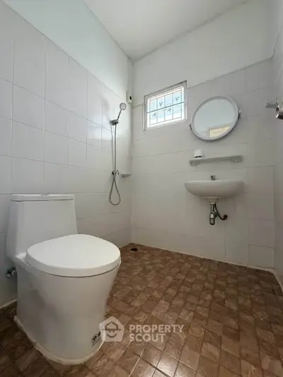 Modern bathroom with shower and toilet in minimalist design