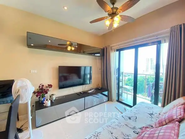 Modern living room with balcony view and stylish decor