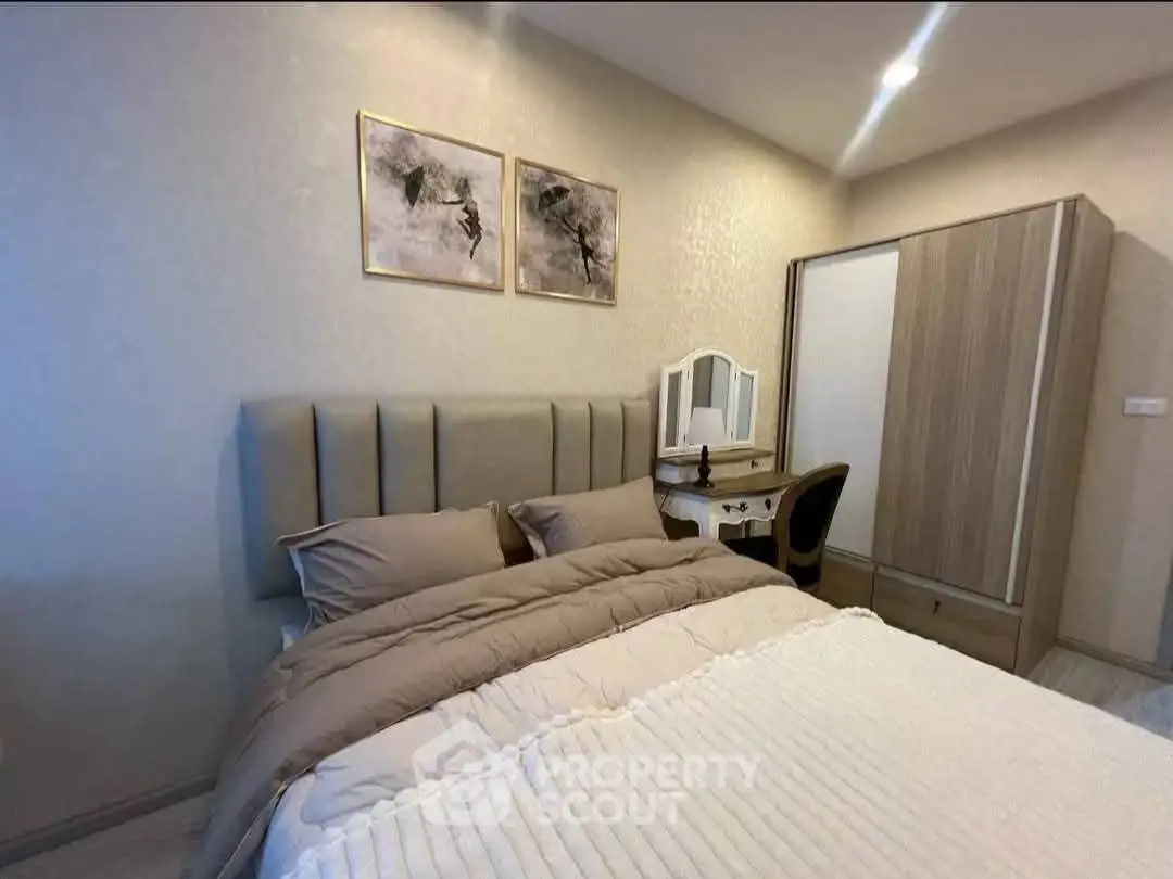 Cozy bedroom with elegant decor and modern furniture, perfect for relaxation.
