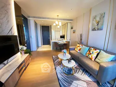 Modern living room with stylish decor and open layout in a luxury apartment.