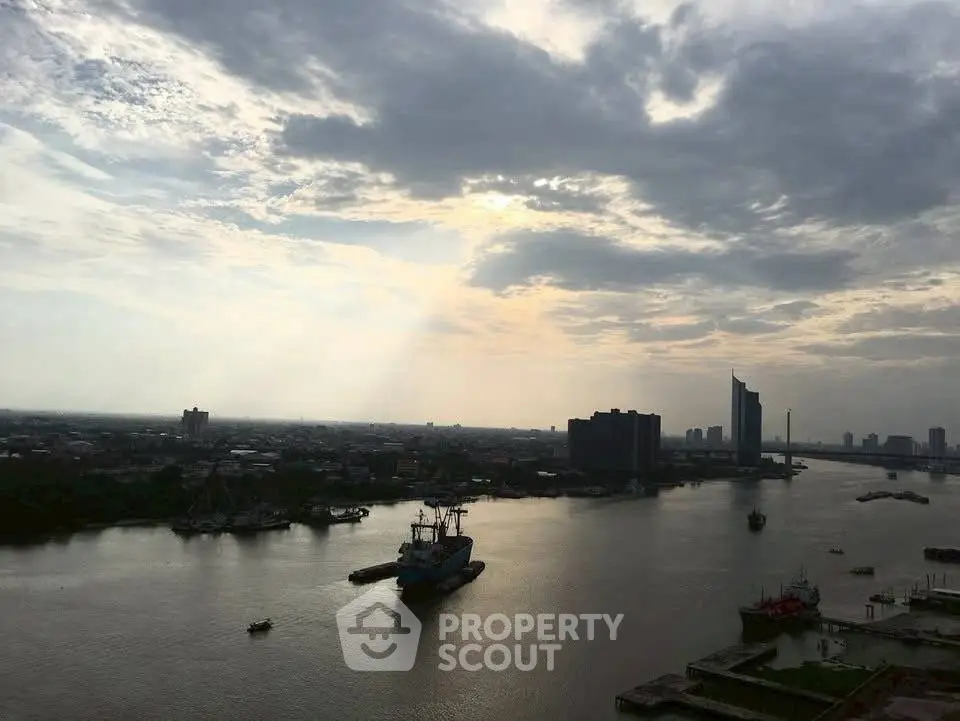 Stunning river view with city skyline, perfect for urban living enthusiasts.