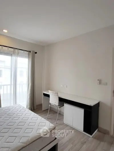 Modern bedroom with minimalist design and natural light