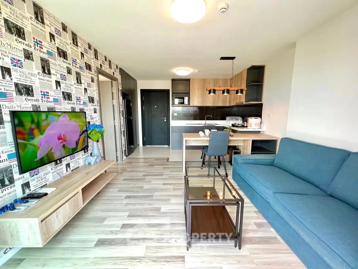 Modern living room with stylish decor and open kitchen layout