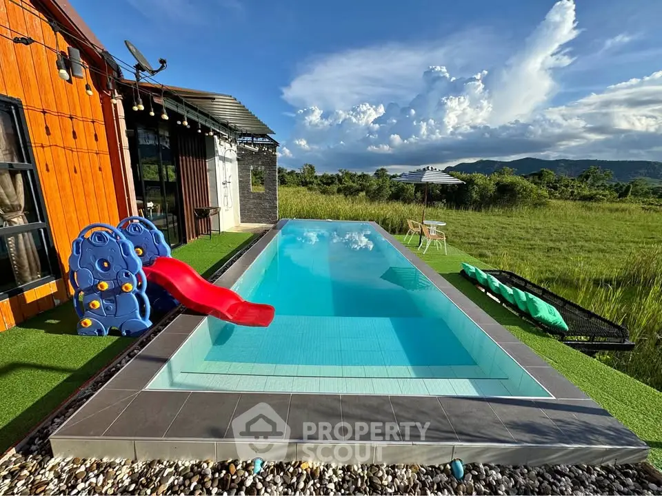 Stunning modern home with private pool and scenic mountain views, perfect for relaxation and family fun.
