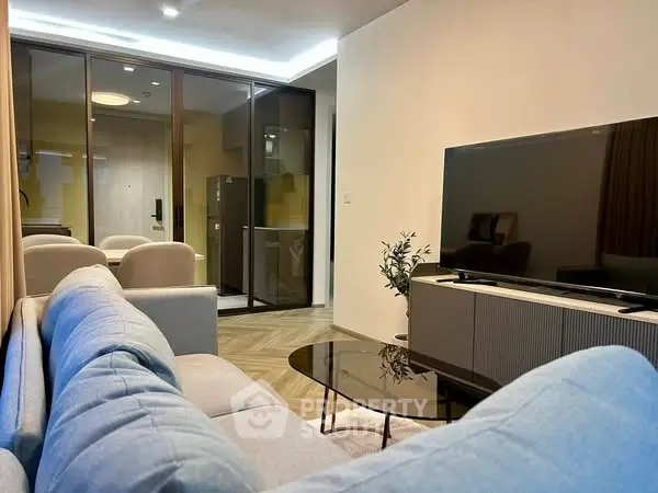 Modern living room with sleek furniture and open layout