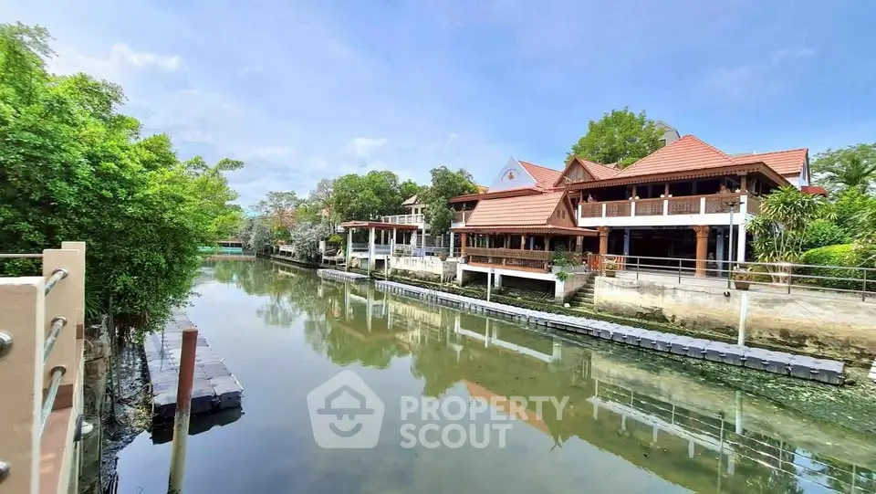 Charming waterfront property with traditional architecture and serene canal views.