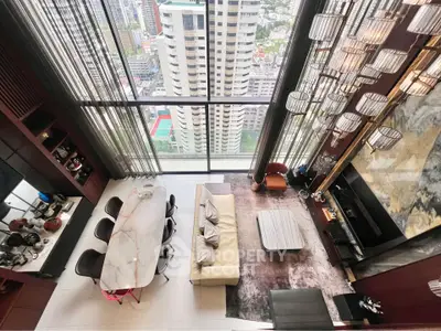 Luxurious high-rise living room with stunning city view and elegant decor