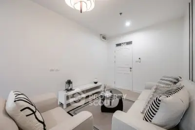 Modern living room with stylish decor and cozy seating area