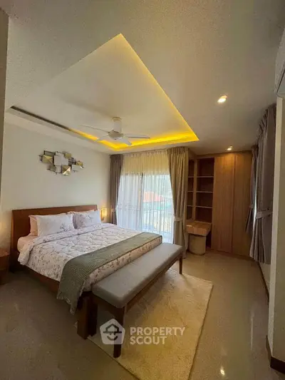 Luxurious bedroom with modern lighting and elegant decor
