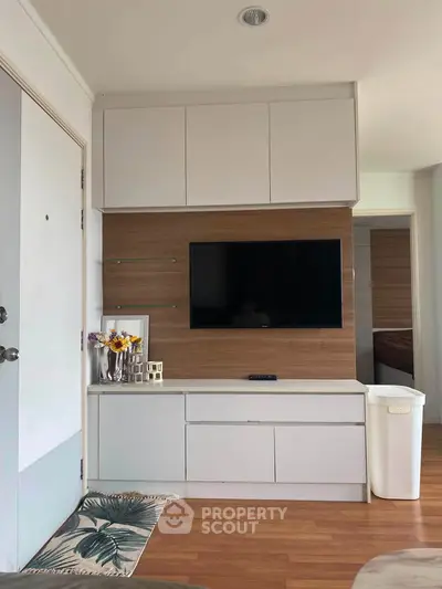 Modern living room with sleek TV setup and stylish decor