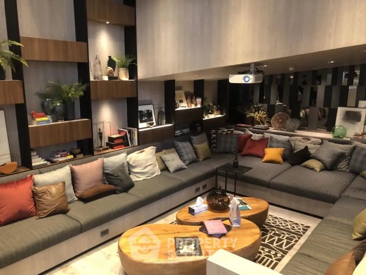 Luxurious living room with modern decor and cozy seating area, perfect for relaxation and entertainment.
