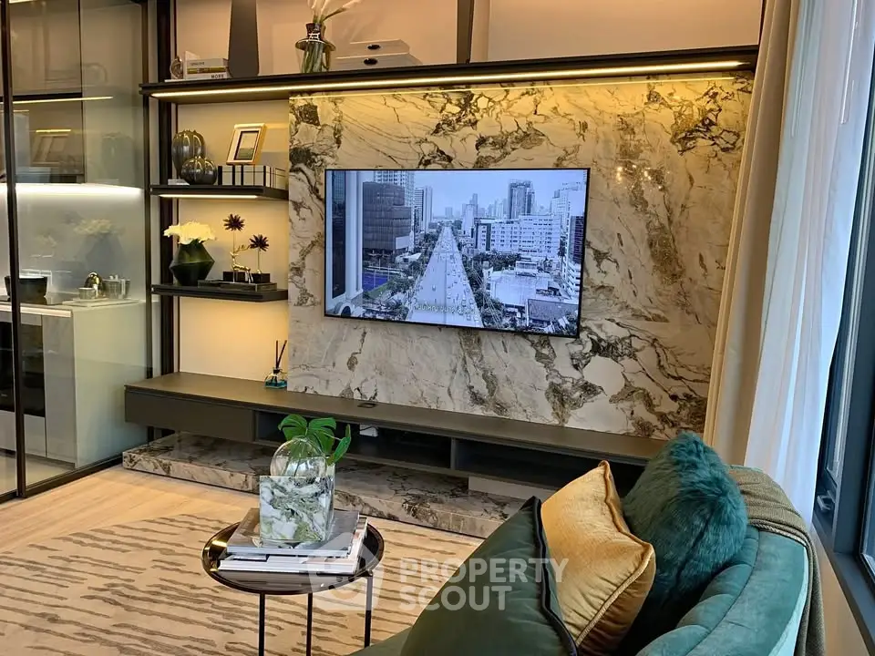 Luxurious living room with marble accent wall and modern decor