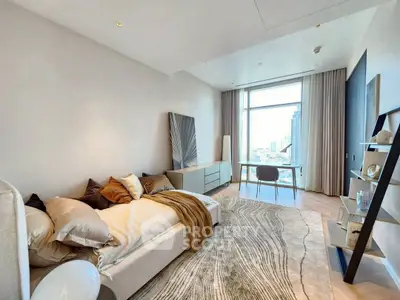 Luxurious bedroom with modern decor and stunning city view