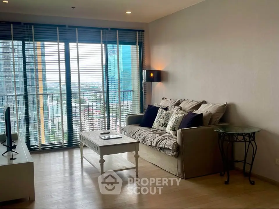 Spacious living room with city view and modern decor