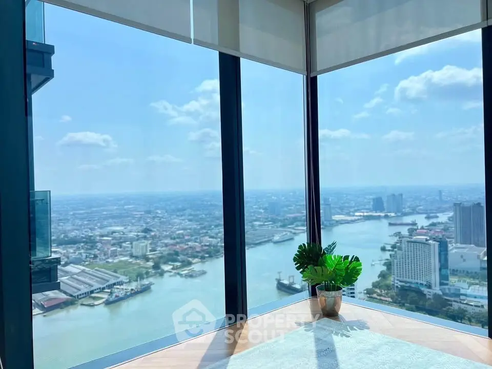 Stunning corner unit with panoramic river view from high-rise building