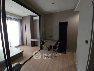 Modern compact living space with sleek design and natural light