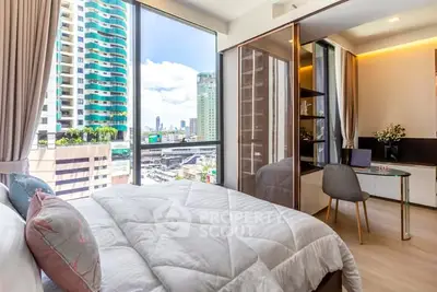 Modern bedroom with city view, large windows, and stylish decor in a high-rise apartment.