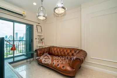 Stylish living room with leather sofa and city view balcony in modern apartment