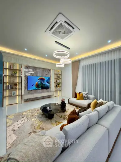 Luxurious modern living room with elegant decor and ambient lighting