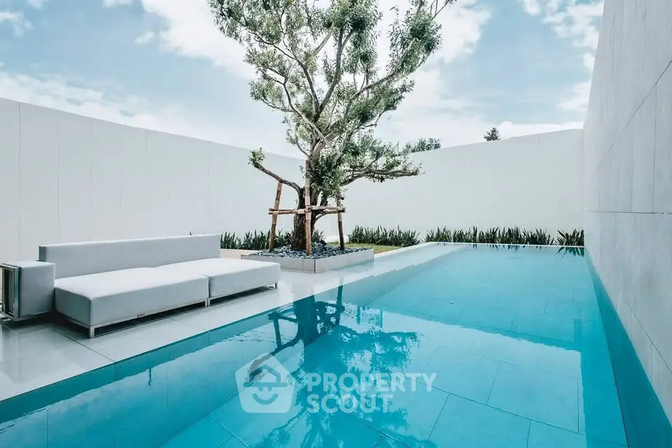 Luxurious modern pool area with sleek design and serene ambiance