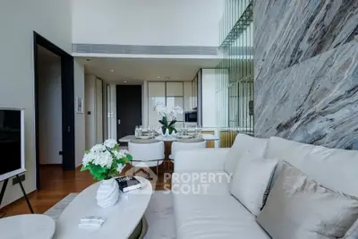 Luxurious modern living room with elegant decor and open layout, perfect for sophisticated urban living.