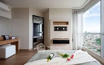 Luxurious bedroom with stunning city view and modern decor