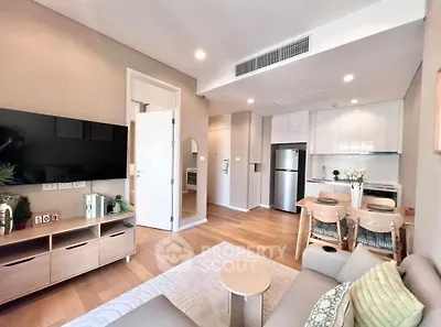 Modern living room with open kitchen and stylish decor