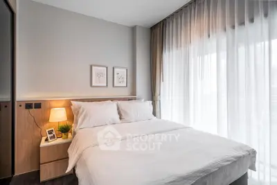 Cozy modern bedroom with soft lighting and elegant decor