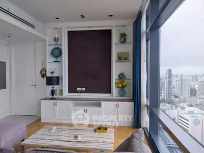 Modern living room with panoramic city view and stylish decor
